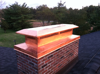 Before and after chimney cap replacement in Commack, NY
