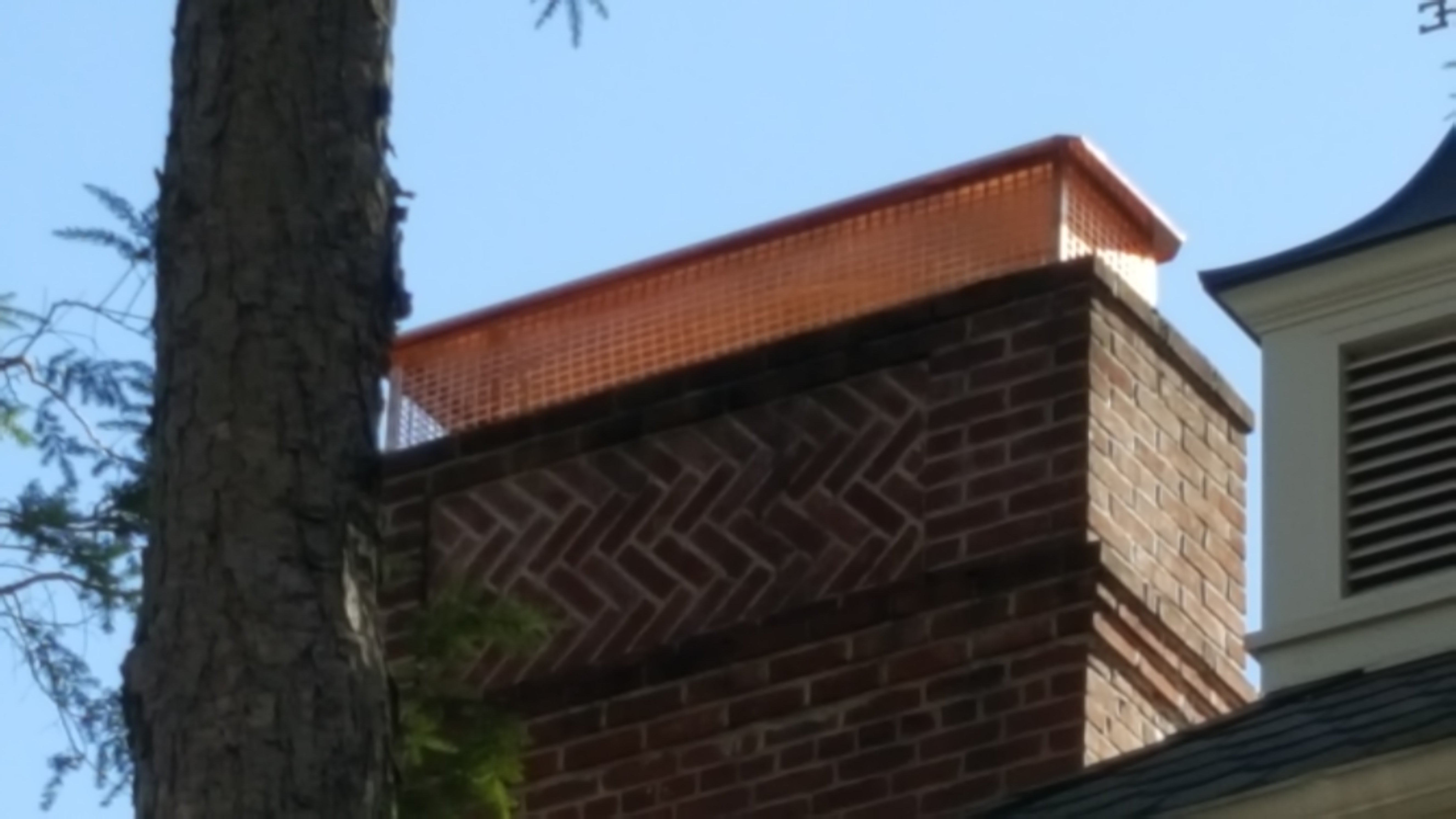 New stainless steel chimney cap installed in Commack, NY