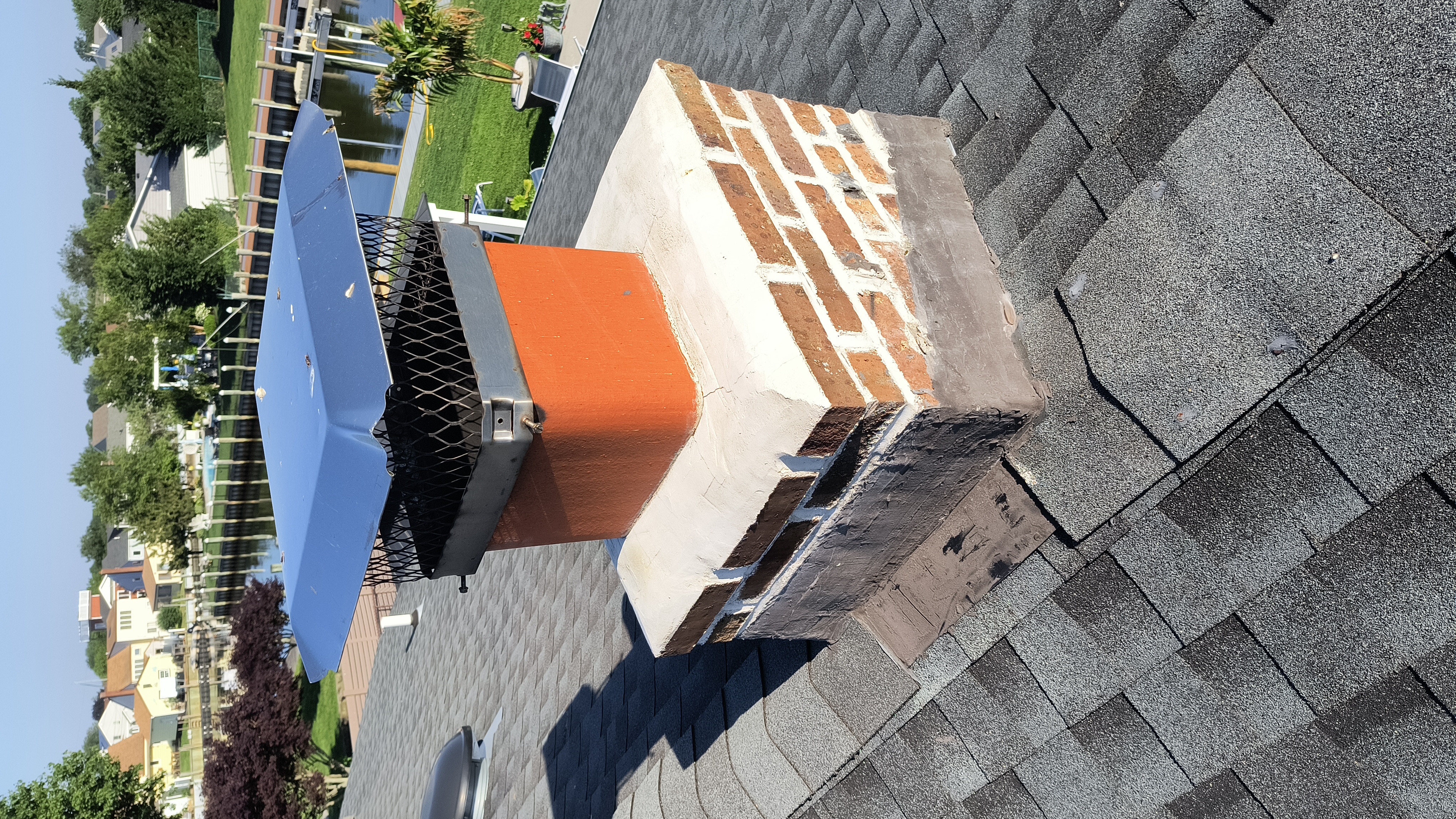 Full chimney masonry rebuild and restoration in Commack, NY