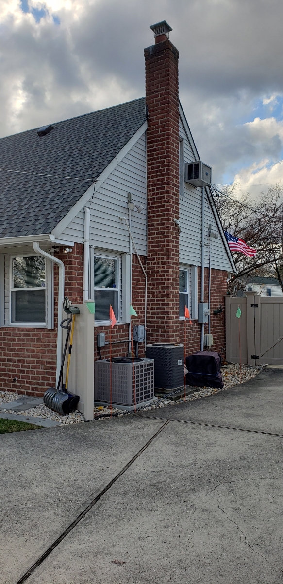 Professional chimney repointing restoring brick joints in Commack, NY