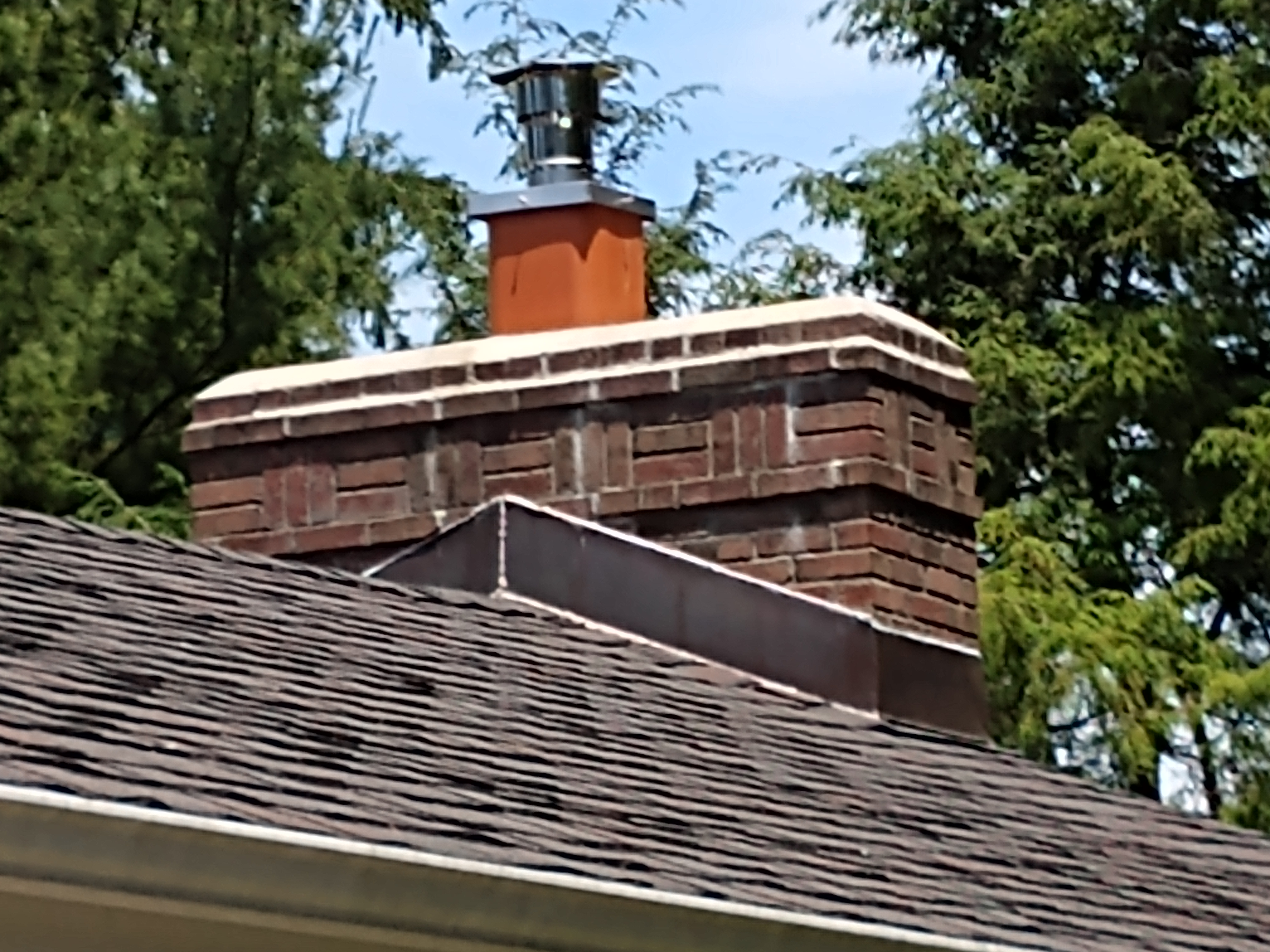 Stainless steel chimney cap with animal guard in Commack, New York